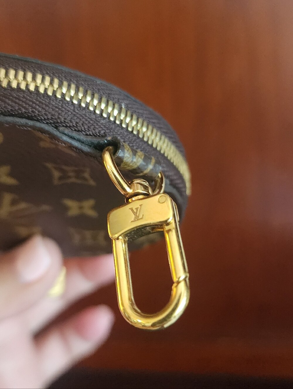 Authenic Louis Vuitton Brown Monogram Round Coin Purse with Gold Hardware